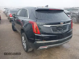 2021 Cadillac XT5 FWD Premium Luxury with VIN 1GYKNCRS2MZ185678, listed as a IAAI auction lot 41143084 with 25,399 mi miles and . Bid and sale history available at carsss.com. Image 3.