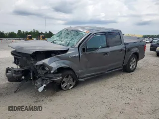 2018 Ford F-150 XL with VIN 1FTEW1E54JFD50664, listed as a Copart auction lot 57517945 with 106,649 mi miles and Salvage title. Bid and sale history available at DreamBid. Image 1.