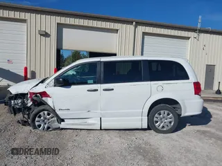 2019 Dodge Grand Caravan SE with VIN 2C7WDGBG7KR803126, listed as a IAAI auction lot 40835937 with 63,100 mi miles and . Bid and sale history available at DreamBid. Image 15.
