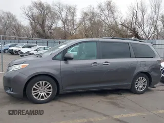 2015 Toyota Sienna XLE with VIN 5TDYK3DC6FS672329, listed as a IAAI auction lot 41908974 with 117,950 mi miles. Bid and sale history available at carsss.com. Image 14.