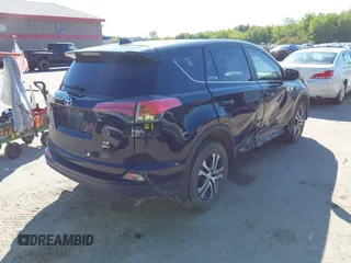 2018 Toyota RAV4 LE with VIN 2T3BFREV7JW717251, listed as a IAAI auction lot 42332563 with 120,193 mi miles and . Bid and sale history available at DreamBid. Image 4.