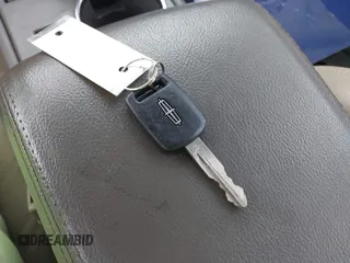2006 Lincoln LS Sport z VIN 1LNFM87A76Y630728, wystawiony jako IAAI lot #42083721 z przebiegiem Nie podano mil oraz . Historia ofert i sprzedaży dostępna na DreamBid. Obrazek 11.