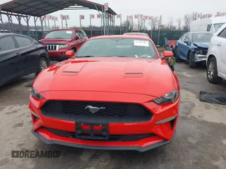 2018 Ford Mustang EcoBoost with VIN 1FA6P8TH1J5158699, listed as a IAAI auction lot 41185702 with 128,862 mi miles and . Bid and sale history available at carsss.com. Image 12.