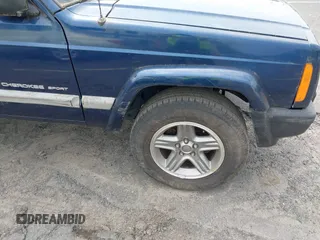 2001 Jeep Cherokee Sport with VIN 1J4FT48S01L604740, listed as a IAAI auction lot 42440685 with 198,284 mi miles and . Bid and sale history available at DreamBid. Image 12.