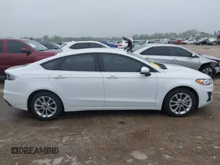 2020 Ford Fusion SE with VIN 3FA6P0LU2LR266943, listed as a IAAI auction lot 42160987 with 61,435 mi miles and . Bid and sale history available at DreamBid. Image 14.