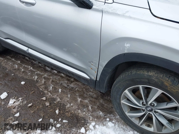 2019 Hyundai Santa Fe Ultimate with VIN 5NMS5CAD1KH000394, listed as a IAAI auction lot 41455421 with 42,886 mi miles and . Bid and sale history available at DreamBid. Image 18.