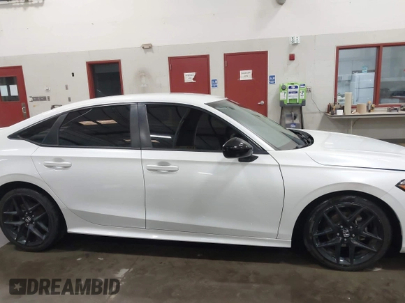 2023 Honda Civic Sport z VIN 2HGFE2F51PH517583, wystawiony jako IAAI lot #41986930 z przebiegiem 42 604 mil mil oraz . Historia ofert i sprzedaży dostępna na DreamBid. Obrazek 13.