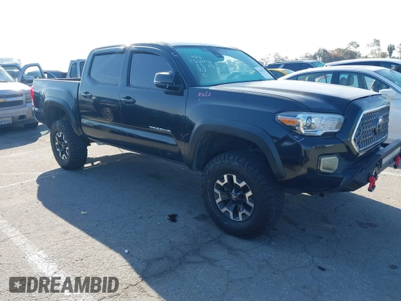 2019 Toyota Tacoma SR z VIN 5TFCZ5AN9KX199814, wystawiony jako IAAI lot #41841821 z przebiegiem 69 276 mil mil oraz . Historia ofert i sprzedaży dostępna na DreamBid. Obrazek 1.