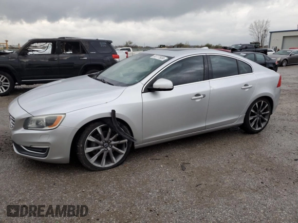 2015 Volvo S60 T6 Drive-E Platinum with VIN YV149MFMXF2335458, listed as a Copart auction lot 80777934 with 140,790 mi miles and Salvage title. Bid and sale history available at DreamBid. Image 1.