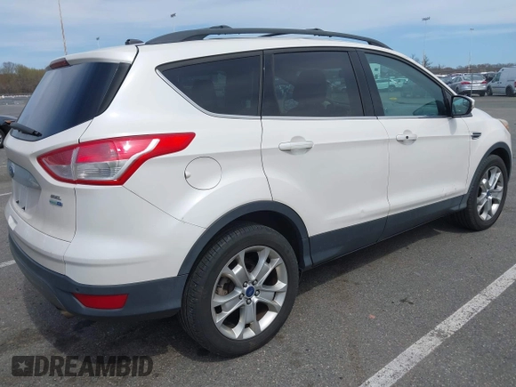 2013 Ford Escape SEL with VIN 1FMCU9HXXDUD82944, listed as a IAAI auction lot 42079667 with 97,304 mi miles. Bid and sale history available at carsss.com. Image 4.