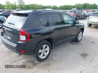 2016 Jeep Compass Sport with VIN 1C4NJDBB7GD757344, listed as a IAAI auction lot 42184933 with 199,430 mi miles and . Bid and sale history available at carsss.com. Image 4.
