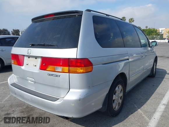 2004 Honda Odyssey EX with VIN 5FNRL18684B143038, listed as a IAAI auction lot 42083469 with 160,317 mi miles and . Bid and sale history available at DreamBid. Image 4.