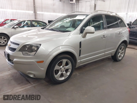 2015 Chevrolet Captiva Sport LT with VIN 3GNAL3EK2FS521222, listed as a IAAI auction lot 42097835 with 128,901 mi miles and . Bid and sale history available at carsss.com. Image 2.