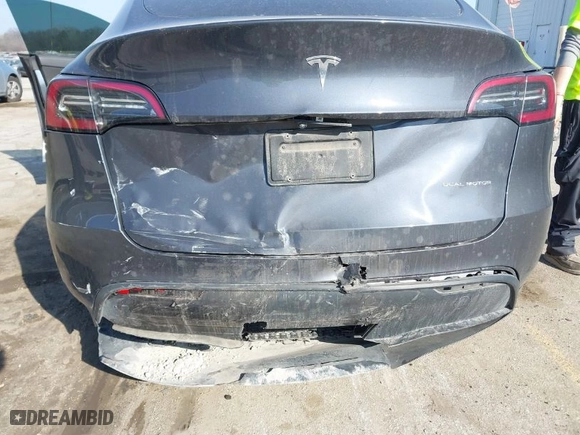 2021 Tesla Model Y Long Range with VIN 5YJYGDEE8MF278212, listed as a IAAI auction lot 41639320 with 53,707 mi miles. Bid and sale history available at carsss.com. Image 6.