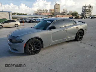 2014 Dodge Charger SE with VIN 2C3CDXBG4EH187870, listed as a Copart auction lot 54370585 with 56,170 mi miles and Salvage Title. Bid and sale history available at DreamBid. Image 1.