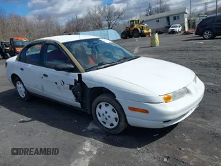 2000 Saturn SL with VIN 1G8ZH5280YZ251280, listed as a IAAI auction lot 41742836 with 180,249 mi miles. Bid and sale history available at carsss.com. Image 1.