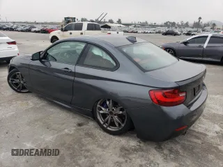 2016 BMW 2 Series M235i with VIN WBA1J7C52GV359572, listed as a Copart auction lot 38942884 with 65,456 mi miles. Bid and sale history available at carsss.com. Image 2.