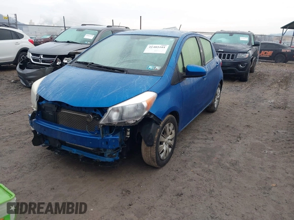 2013 Toyota Yaris L with VIN JTDKTUD30DD553855, listed as a IAAI auction lot 41485101 with 83,546 mi miles. Bid and sale history available at carsss.com. Image 2.