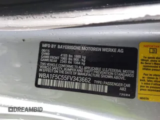 2015 BMW 2 Series 228i with VIN WBA1F5C55FV343662, listed as a IAAI auction lot 41729309 with 90,770 mi miles. Bid and sale history available at carsss.com. Image 9.