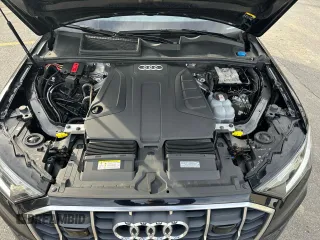 2021 Audi Q7 Premium Plus with VIN WA1LJAF78MD032627, listed as a Copart auction lot 50009015 with 128,942 mi miles and Clean title. Bid and sale history available at DreamBid. Image 5.