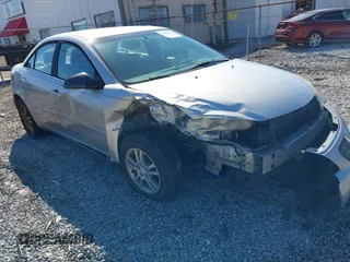 2006 Pontiac G6 6-Cyl z VIN 1G2ZG558964282448, wystawiony jako IAAI lot #41475157 z przebiegiem 212 395 mil mil oraz . Historia ofert i sprzedaży dostępna na DreamBid. Obrazek 1.