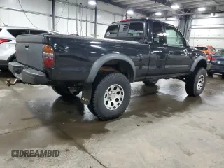 2004 Toyota Tacoma with VIN 5TEWN72N14Z424211, listed as a Copart auction lot 51815615 with 203,415 mi miles and Salvage Title. Bid and sale history available at DreamBid. Image 3.