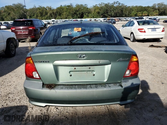 2005 Hyundai Accent GLS with VIN KMHCG35C75U328380, listed as a Copart auction lot 74935354 with 4,848 mi miles and Salvage Title. Bid and sale history available at carsss.com. Image 6.