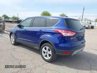 2015 Ford Escape SE with VIN 1FMCU0GX1FUB81563, listed as a IAAI auction lot 41564612 with 120,582 mi miles and . Bid and sale history available at DreamBid. Image 3.