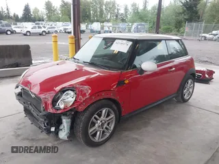 2012 MINI Hardtop with VIN WMWSU3C58CT262077, listed as a IAAI auction lot 42140178 with 70,099 mi miles and . Bid and sale history available at DreamBid. Image 2.