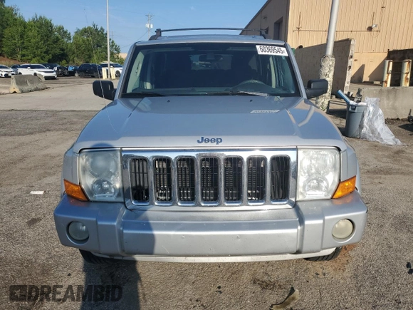 2010 Jeep Commander Sport with VIN 1J4RG4GK4AC125711, listed as a Copart auction lot 60369545 with 209,522 mi miles and Clean title. Bid and sale history available at DreamBid. Image 5.