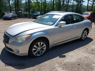 2012 Infiniti M with VIN JN1BY1AR4CM396809, listed as a IAAI auction lot 42394230 with 227,846 mi miles and . Bid and sale history available at DreamBid. Image 2.