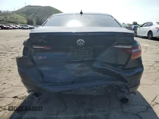2019 Volkswagen Jetta GLI S with VIN 3VW5T7BU9KM143452, listed as a Copart auction lot 52015965 with 115,652 mi miles and Salvage title. Bid and sale history available at DreamBid. Image 6.