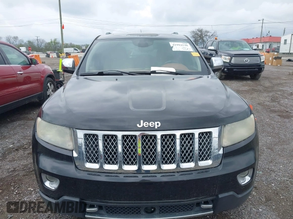 2012 Jeep Grand Cherokee Overland with VIN 1C4RJECT3CC281835, listed as a IAAI auction lot 41994148 with 145,741 mi miles. Bid and sale history available at carsss.com. Image 6.