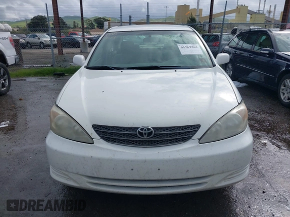 2002 Toyota Camry XLE z VIN 4T1BF30KX2U035422, wystawiony jako IAAI lot #41762363 z przebiegiem 220 465 mil mil oraz . Historia ofert i sprzedaży dostępna na DreamBid. Obrazek 12.