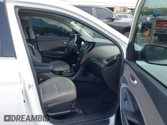 2017 Hyundai Santa Fe 2.4L z VIN 5XYZTDLB3HG439072, wystawiony jako IAAI lot #42061127 z przebiegiem 145 864 mil mil oraz . Historia ofert i sprzedaży dostępna na DreamBid. Obrazek 5.