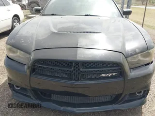 2012 Dodge Charger SRT8 with VIN 2C3CDXEJ7CH169853, listed as a IAAI auction lot 41857468 with 145,016 mi miles. Bid and sale history available at carsss.com. Image 6.