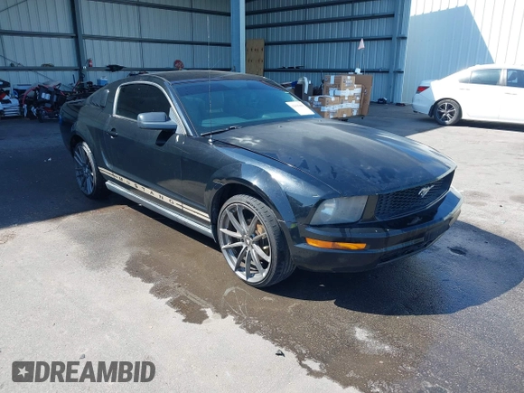 2005 Ford Mustang Deluxe with VIN 1ZVFT80N455122217, listed as a IAAI auction lot 42015083 with 154,396 mi miles. Bid and sale history available at carsss.com. Image 1.