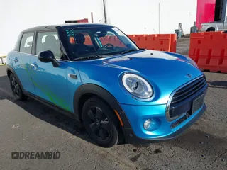 2018 MINI Hardtop 4 Door Cooper with VIN WMWXU1C52J2F92989, listed as a IAAI auction lot 40963505 with 34,712 mi miles and . Bid and sale history available at DreamBid. Image 1.