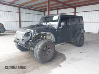 2012 Jeep Wrangler Unlimited Sport с VIN 1C4BJWDGXCL154296, выставлен на аукционе IAAI как лот 42748480 с пробегом 100 921 миль миль и . История ставок и продаж доступна на DreamBid. Изображение 2.