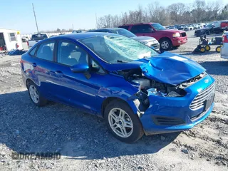 2018 Ford Fiesta SE with VIN 3FADP4BJ4JM135965, listed as a IAAI auction lot 41569841 with 128,347 mi miles. Bid and sale history available at carsss.com. Image 1.