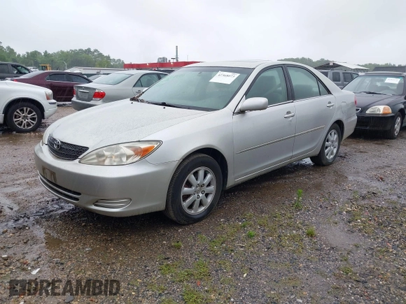 2002 Toyota Camry XLE z VIN JTDBF30K420083381, wystawiony jako IAAI lot #42368073 z przebiegiem 148 746 mil mil oraz . Historia ofert i sprzedaży dostępna na DreamBid. Obrazek 2.
