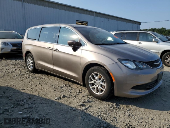 2017 Chrysler Pacifica Touring with VIN 2C4RC1DG1HR536856, listed as a Copart auction lot 58973155 with 142,520 mi miles and Salvage title. Bid and sale history available at DreamBid. Image 4.