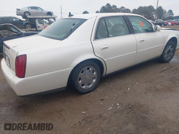 2002 Cadillac DeVille DHS z VIN 1G6KE57YX2U212020, wystawiony jako IAAI lot #41287342 z przebiegiem Nie podano mil oraz . Historia ofert i sprzedaży dostępna na DreamBid. Obrazek 4.