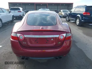 2008 Jaguar XK with VIN SAJWA43C089B22700, listed as a IAAI auction lot 41585734 with 67,946 mi miles. Bid and sale history available at carsss.com. Image 16.