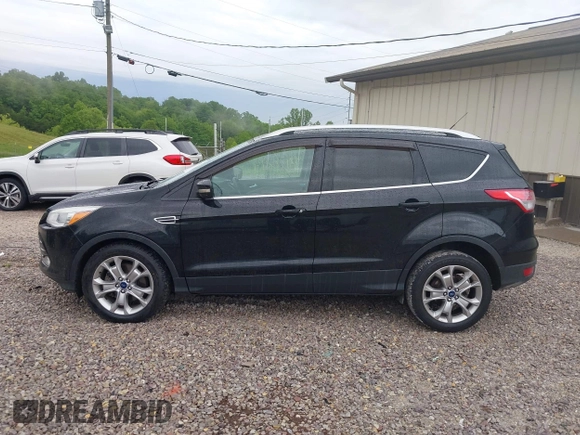 2016 Ford Escape Titanium with VIN 1FMCU9J93GUB93729, listed as a IAAI auction lot 42177294 with 158,859 mi miles and . Bid and sale history available at DreamBid. Image 14.