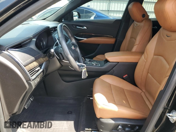 2020 Cadillac XT4 FWD Sport with VIN 1GYFZER48LF012489, listed as a Copart auction lot 54434025 with 74,249 mi miles and Salvage title. Bid and sale history available at DreamBid. Image 7.