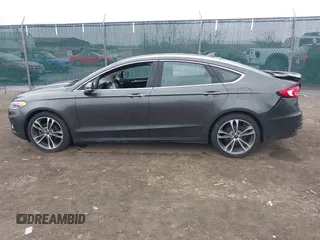 2019 Ford Fusion Titanium with VIN 3FA6P0K9XKR259556, listed as a IAAI auction lot 41823997 with 132,071 mi miles. Bid and sale history available at carsss.com. Image 14.