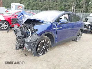2022 Volkswagen ID.4 Pro S z VIN WVGGNPE26NP036269, wystawiony jako IAAI lot #42279904 z przebiegiem 43 959 mil mil oraz . Historia ofert i sprzedaży dostępna na DreamBid. Obrazek 2.