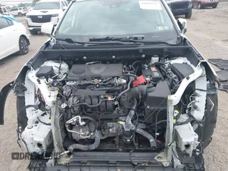 2022 Toyota RAV4 XLE Premium z VIN 2T3A1RFV4NW287421, wystawiony jako IAAI lot #42602371 z przebiegiem 59 294 mil mil oraz . Historia ofert i sprzedaży dostępna na DreamBid. Obrazek 10.