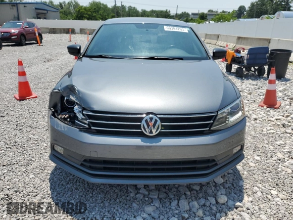 2015 Volkswagen Jetta SE with VIN 3VWD17AJ2FM323094, listed as a Copart auction lot 60304265 with 115,540 mi miles and Salvage title. Bid and sale history available at DreamBid. Image 5.